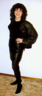 A picture of Kim in leather skirt and jacket